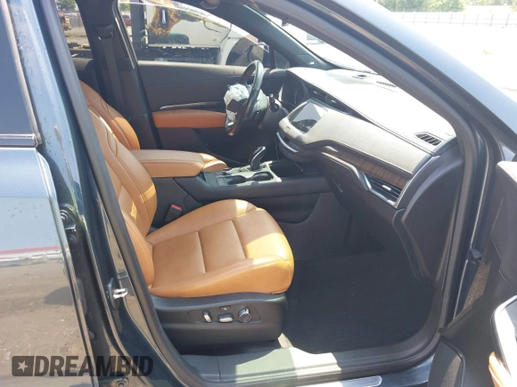 2021 Cadillac XT4 FWD Sport with VIN 1GYFZER41MF079193, listed as a IAAI auction lot 42331594 with 72,287 mi miles and . Bid and sale history available at DreamBid. Image 5.