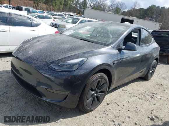 2025 Tesla Model Y Long Range with VIN 7SAYGDED3SA352138, listed as a IAAI auction lot 41760798 with 1,209 mi miles and . Bid and sale history available at DreamBid. Image 22.
