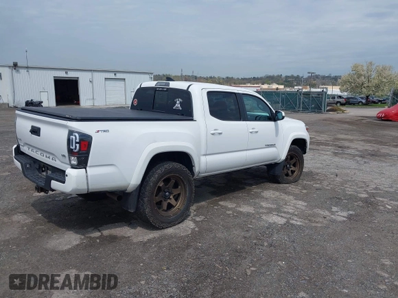 2018 Toyota Tacoma SR with VIN 3TMCZ5AN5JM125066, listed as a IAAI auction lot 41961168 with 88,497 mi miles. Bid and sale history available at carsss.com. Image 4.