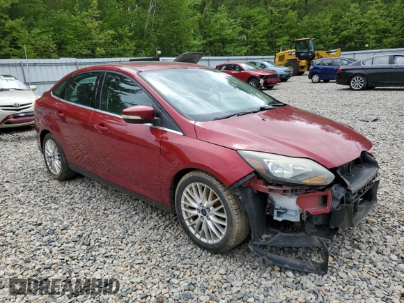 2014 Ford Focus Titanium with VIN 1FADP3J20EL352909, listed as a Copart auction lot 58501085 with 174,388 mi miles and Salvage title. Bid and sale history available at DreamBid. Image 4.