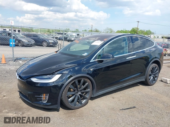2019 Tesla Model X 75D with VIN 5YJXCBE21KF180203, listed as a IAAI auction lot 42190255 with 114,294 mi miles and . Bid and sale history available at DreamBid. Image 2.