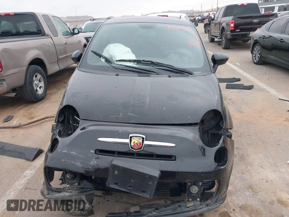 2012 FIAT 500 Abarth z VIN 3C3CFFFH3CT381608, wystawiony jako IAAI lot #41432123 z przebiegiem 116 920 mil mil oraz . Historia ofert i sprzedaży dostępna na DreamBid. Obrazek 13.