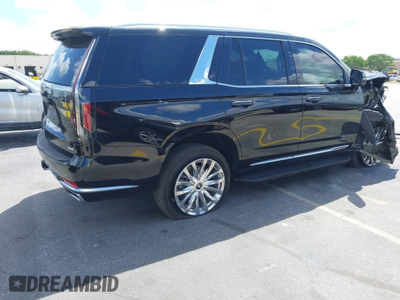 2023 Cadillac Escalade 4WD Premium Luxury with VIN 1GYS4BKL4PR236070, listed as a IAAI auction lot 41905971 with 40,382 mi miles and . Bid and sale history available at DreamBid. Image 4.
