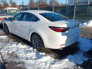 2021 Mazda 6 Sport with VIN JM1GL1UM8M1612598, listed as a IAAI auction lot 41277726 with 19,415 mi miles and . Bid and sale history available at carsss.com. Image 3.