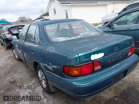 1996 Toyota Camry DX with VIN JT2BG12K1T0344507, listed as a IAAI auction lot 41832481 with 176,216 mi miles. Bid and sale history available at carsss.com. Image 3.