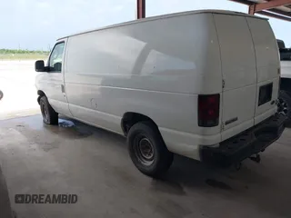 2006 Ford Econoline Cargo with VIN 1FTNE24W06HB02149, listed as a IAAI auction lot 42055924 with 229,432 mi miles and . Bid and sale history available at DreamBid. Image 3.