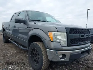 2011 Ford F-150 XLT with VIN 1FTFW1ET4BFC23725, listed as a IAAI auction lot 42018932 with 323,160 mi miles. Bid and sale history available at carsss.com. Image 1.