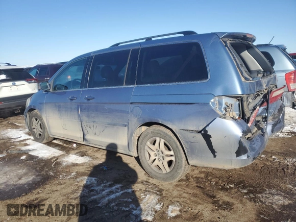 2006 Honda Odyssey EX-L with VIN 5FNRL387X6B013141, listed as a Copart auction lot 42909345 with 220,725 mi miles and Salvage Title. Bid and sale history available at carsss.com. Image 2.