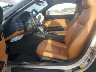 2011 BMW Z4 sDrive30i with VIN WBALM5C5XBE379369, listed as a Copart auction lot 48490475 with 99,425 mi miles and Salvage Title. Bid and sale history available at carsss.com. Image 7.