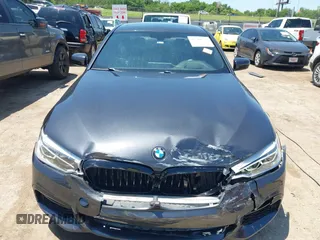 2017 BMW 5 Series 540i z VIN WBAJE5C33HG916941, wystawiony jako IAAI lot #42504534 z przebiegiem 115 127 mil mil oraz . Historia ofert i sprzedaży dostępna na DreamBid. Obrazek 12.
