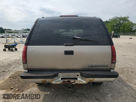 1999 Chevrolet Tahoe Z71 with VIN 1GNEK13R6XJ301562, listed as a Copart auction lot 59684595 with 200,561 mi miles and Salvage title. Bid and sale history available at DreamBid. Image 6.