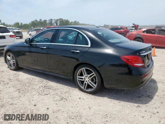 2017 Mercedes-Benz E 300 Luxury with VIN WDDZF4JB8HA123652, listed as a Copart auction lot 57050205 with 105,048 mi miles and Salvage title. Bid and sale history available at DreamBid. Image 2.