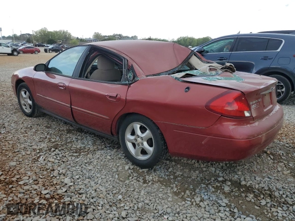 2000 Ford Taurus SES with VIN 1FAFP55U1YA262488, listed as a Copart auction lot 52312645 with 128,621 mi miles and Salvage Title. Bid and sale history available at DreamBid. Image 2.