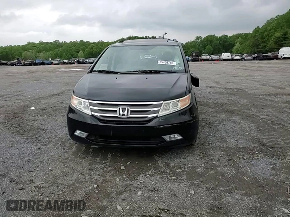 2013 Honda Odyssey EX-L with VIN 5FNRL5H69DB031498, listed as a Copart auction lot 55459745 with 129,773 mi miles and Salvage title. Bid and sale history available at DreamBid. Image 14.