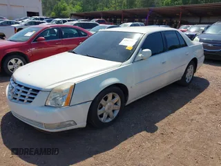 2006 Cadillac DTS w/1SC with VIN 1G6KD57Y36U116528, listed as a IAAI auction lot 42063595 with 128,839 mi miles. Bid and sale history available at carsss.com. Image 2.
