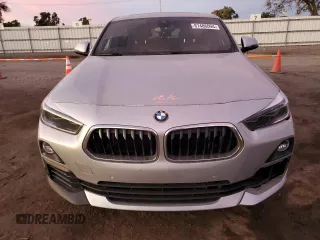 2020 BMW X2 sDrive28i with VIN WBXYH9C09L5P95698, listed as a Copart auction lot 87486094 with 45,319 mi miles and Salvage Title. Bid and sale history available at carsss.com. Image 5.