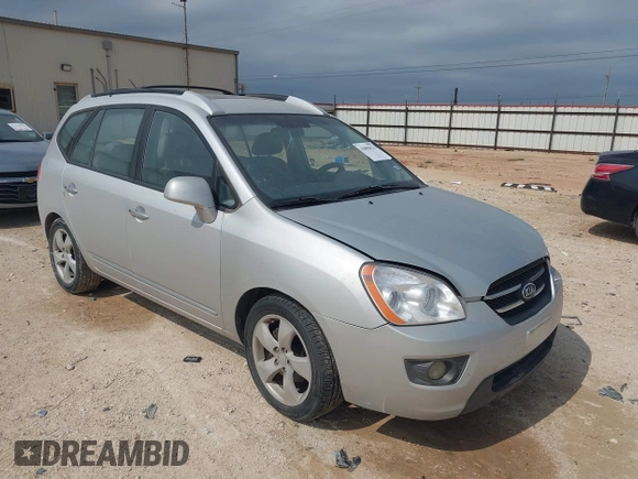 2007 Kia Rondo LX with VIN KNAFG526077069189, listed as a IAAI auction lot 42090474 with 96,722 mi miles. Bid and sale history available at carsss.com. Image 1.