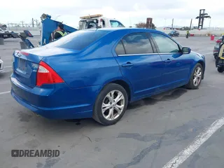 2012 Ford Fusion SE with VIN 3FAHP0HA9CR351141, listed as a IAAI auction lot 42140427 with 219,049 mi miles. Bid and sale history available at carsss.com. Image 4.
