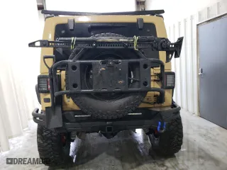 2012 Jeep Wrangler Unlimited Sahara with VIN 1C4BJWEG5CL281584, listed as a Copart auction lot 50982655 with 132,548 mi miles and Salvage Title. Bid and sale history available at carsss.com. Image 6.