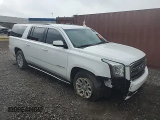 2020 GMC Yukon XL SLT with VIN 1GKS1GKC7LR292465, listed as a Copart auction lot 61487784 with 106,103 mi miles and Salvage Title. Bid and sale history available at carsss.com. Image 4.