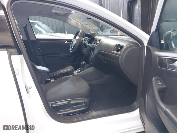 2015 Volkswagen Jetta Sedan 2.0L S with VIN 3VW2K7AJ5FM287843, listed as a IAAI auction lot 41273524 with 94,558 mi miles. Bid and sale history available at carsss.com. Image 5.