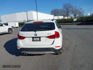 2015 BMW X1 xDrive28i with VIN WBAVL1C50FVY26009, listed as a IAAI auction lot 41495667 with 109,807 mi miles. Bid and sale history available at carsss.com. Image 16.