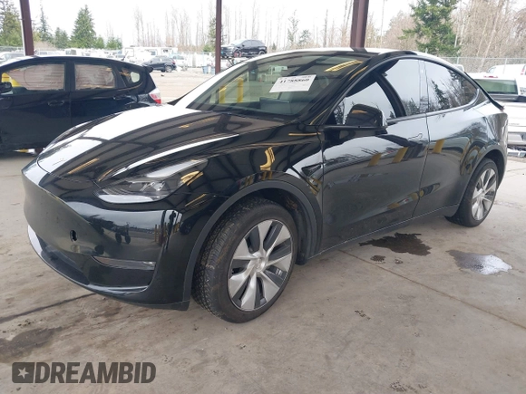 2023 Tesla Model Y Long Range with VIN 7SAYGDEE4PF789102, listed as a IAAI auction lot 41788860 with 88,457 mi miles and . Bid and sale history available at DreamBid. Image 2.