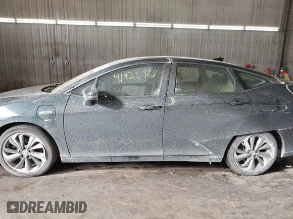 2018 Honda Clarity Touring z VIN JHMZC5F39JC002521, wystawiony jako IAAI lot #41428968 z przebiegiem 64 014 mil mil oraz . Historia ofert i sprzedaży dostępna na DreamBid. Obrazek 15.