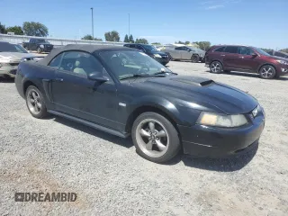 2003 Ford Mustang GT Deluxe z VIN 1FAFP45X23F436939, wystawiony jako Copart lot #61106135 z przebiegiem 105 860 mil mil oraz Czysty tytuł • Clean title. Historia ofert i sprzedaży dostępna na DreamBid. Obrazek 4.