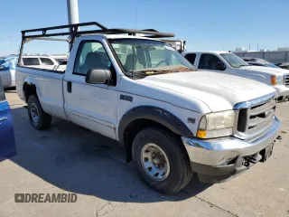 2002 Ford F-350 with VIN 1FTSF30S02EC49608, listed as a Copart auction lot 76176934 with 146,708 mi miles and Clean title. Bid and sale history available at DreamBid. Image 4.