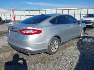 2015 Ford Fusion S with VIN 3FA6P0G77FR135015, listed as a IAAI auction lot 41399694 with 132,175 mi miles. Bid and sale history available at carsss.com. Image 4.