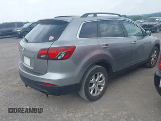 2013 Mazda CX-9 Sport with VIN JM3TB3BA2D0407491, listed as a IAAI auction lot 42430839 with 162,827 mi miles and . Bid and sale history available at DreamBid. Image 4.