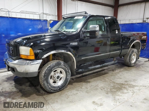 1999 Ford F-250 XL with VIN 1FTNX21SXXEE02893, listed as a Copart auction lot 75717534 with 127,574 mi miles and Clean title. Bid and sale history available at DreamBid. Image 1.