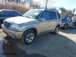 2005 Suzuki Grand Vitara LX with VIN JS3TD62V454200331, listed as a IAAI auction lot 41896812 with 122,974 mi miles. Bid and sale history available at carsss.com. Image 2.