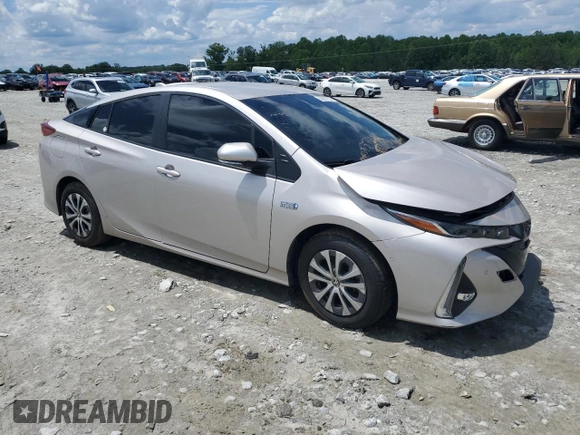 2021 Toyota Prius LE with VIN JTDKAMFPXM3184126, listed as a Copart auction lot 56857675 with 54,676 mi miles and Clean Title. Bid and sale history available at DreamBid. Image 4.
