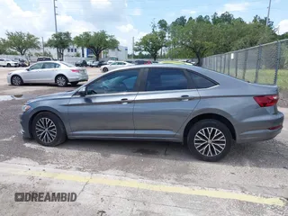 2021 Volkswagen Jetta S z VIN 3VWC57BU4MM009727, wystawiony jako IAAI lot #42339309 z przebiegiem 52 395 mil mil oraz . Historia ofert i sprzedaży dostępna na DreamBid. Obrazek 15.