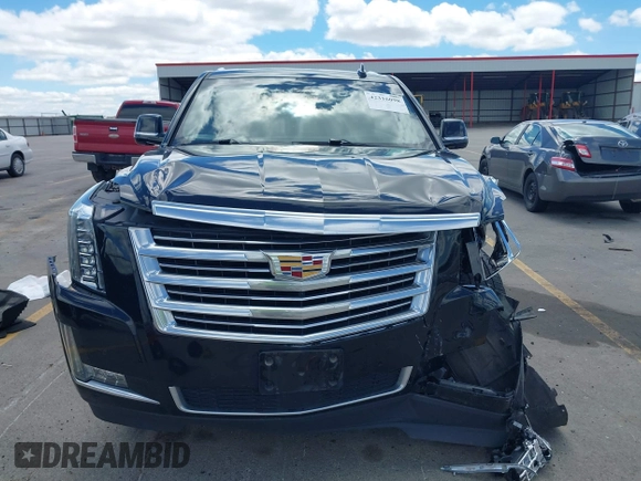 2015 Cadillac Escalade Platinum z VIN 1GYS4PKJ8FR568958, wystawiony jako IAAI lot #42316098 z przebiegiem 152 661 mil mil oraz . Historia ofert i sprzedaży dostępna na DreamBid. Obrazek 12.
