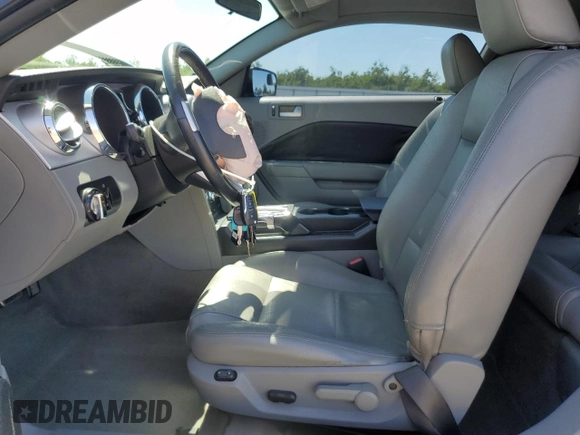 2007 Ford Mustang Deluxe with VIN 1ZVFT80N875349736, listed as a Copart auction lot 58098075 with 195,370 mi miles and Salvage title. Bid and sale history available at DreamBid. Image 7.