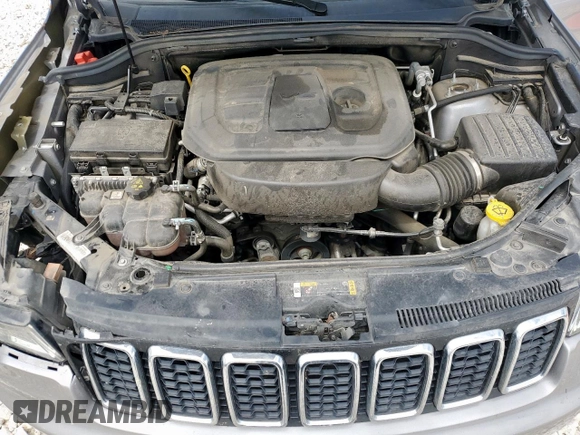 2021 Jeep Grand Cherokee Laredo X z VIN 1C4RJEAG2MC681229, wystawiony jako Copart lot #57771765 z przebiegiem 110 671 mil mil oraz Szkoda całkowita • Salvage title. Historia ofert i sprzedaży dostępna na DreamBid. Obrazek 11.