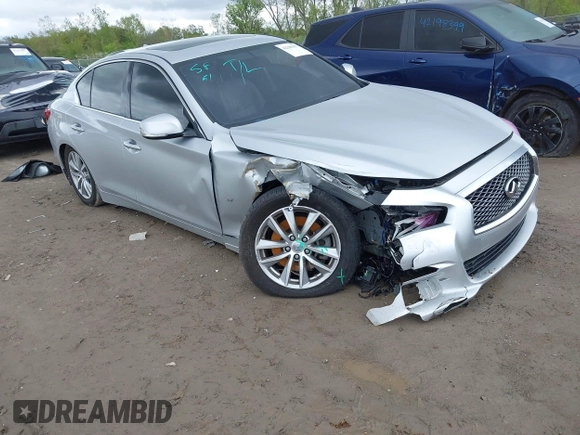2015 Infiniti Q50 Premium z VIN JN1BV7AR8FM390785, wystawiony jako IAAI lot #42200437 z przebiegiem 94 841 mil mil oraz . Historia ofert i sprzedaży dostępna na DreamBid. Obrazek 1.