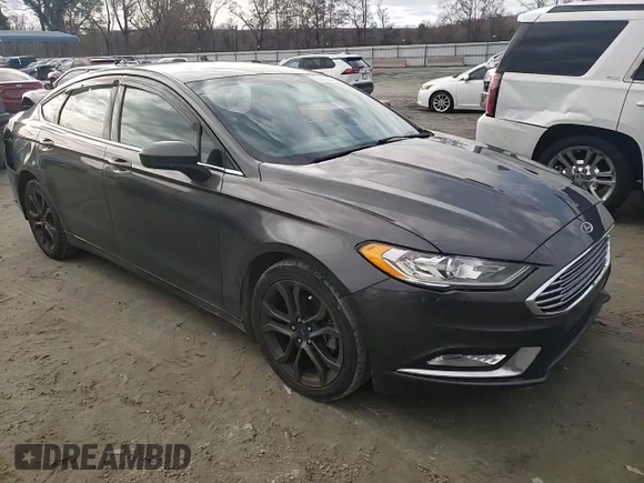 2018 Ford Fusion S z VIN 3FA6P0G70JR264965, wystawiony jako Copart lot #85553684 z przebiegiem 235 205 mil mil oraz Szkoda całkowita • Salvage title. Historia ofert i sprzedaży dostępna na DreamBid. Obrazek 11.