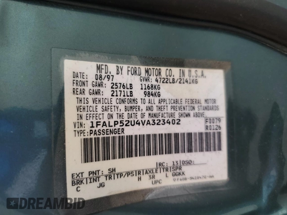 1997 Ford Taurus GL with VIN 1FALP52U4VA323402, listed as a Copart auction lot 65742235 with 43,415 mi miles and Clean title. Bid and sale history available at DreamBid. Image 12.