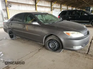 2004 Toyota Camry LE with VIN 4T1BE32K74U884720, listed as a Copart auction lot 49534195 with 253,516 mi miles and Salvage Title. Bid and sale history available at DreamBid. Image 4.
