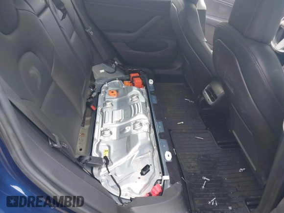 2019 Tesla Model 3 Mid Range with VIN 5YJ3E1EA5KF299589, listed as a IAAI auction lot 41709733 with 50,256 mi miles and . Bid and sale history available at DreamBid. Image 8.