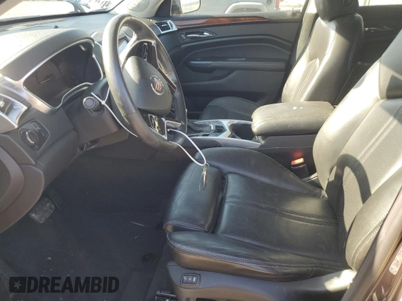 2015 Cadillac SRX Luxury Collection z VIN 3GYFNEE37FS524771, wystawiony jako Copart lot #53274144 z przebiegiem 39 348 mil mil oraz Szkoda całkowita • Salvage title. Historia ofert i sprzedaży dostępna na DreamBid. Obrazek 7.