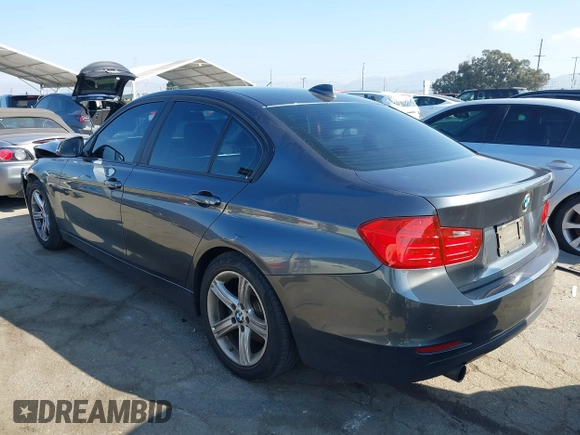 2015 BMW 3 Series 320i with VIN WBA3B1C55FK140317, listed as a IAAI auction lot 41434306 with 120,627 mi miles. Bid and sale history available at carsss.com. Image 3.
