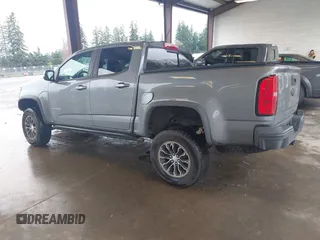 2018 Chevrolet Colorado 4WD ZR2 with VIN 1GCGTEEN9J1325135, listed as a IAAI auction lot 41869769 with 77,327 mi miles. Bid and sale history available at carsss.com. Image 3.