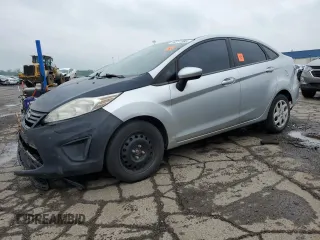 2012 Ford Fiesta SE z VIN 3FADP4BJ4CM125634, wystawiony jako Copart lot #59911995 z przebiegiem 168 371 mil mil oraz Czysty tytuł • Clean title. Historia ofert i sprzedaży dostępna na DreamBid. Obrazek 1.