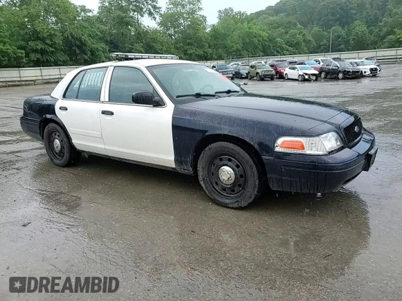 2011 Ford Police Interceptor with VIN 2FABP7BV8BX160188, listed as a Copart auction lot 59710915 with 142,316 mi miles and Salvage title. Bid and sale history available at DreamBid. Image 13.