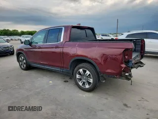 2019 Honda Ridgeline RTL-T with VIN 5FPYK2F60KB002573, listed as a Copart auction lot 63570755 with 111,388 mi miles and Salvage title. Bid and sale history available at DreamBid. Image 2.